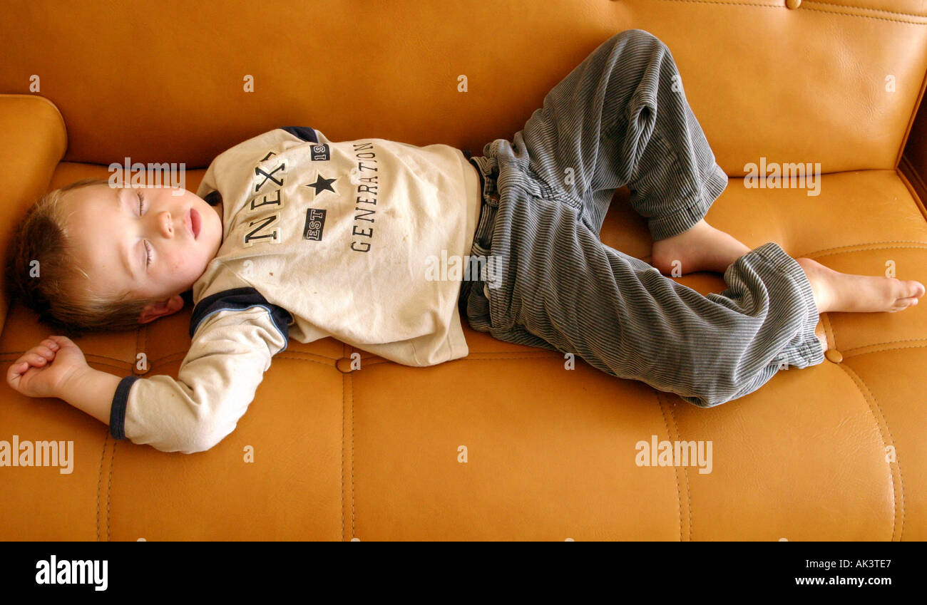 Young Toddler Sleeping On Sofa Stock Photo 4857062 Alamy