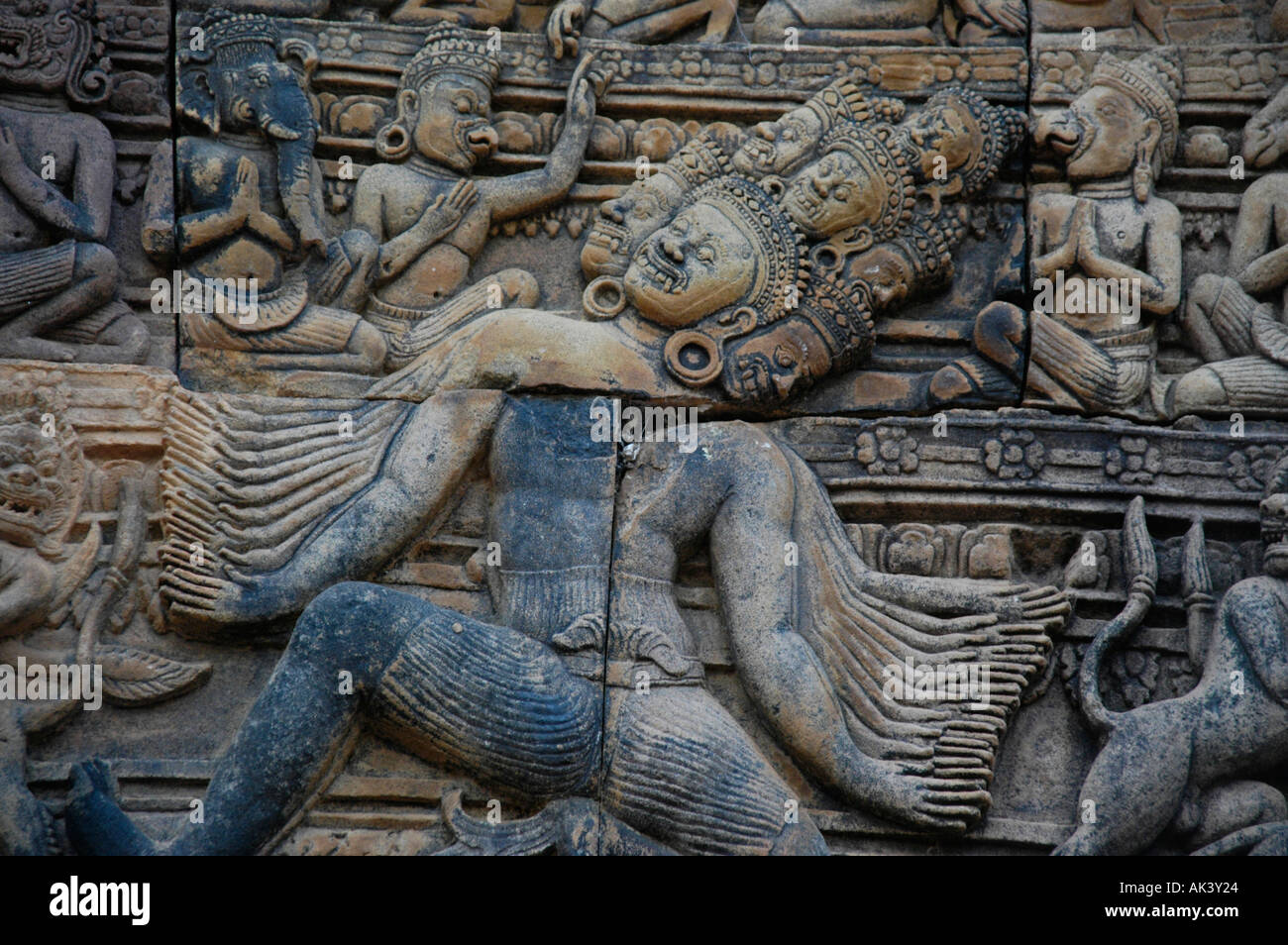 Stone relief of fine arts showing a mythological figure Ravana of the Ramayana temple Branteay Srei Angkor Siem Reap Cambodia Stock Photo