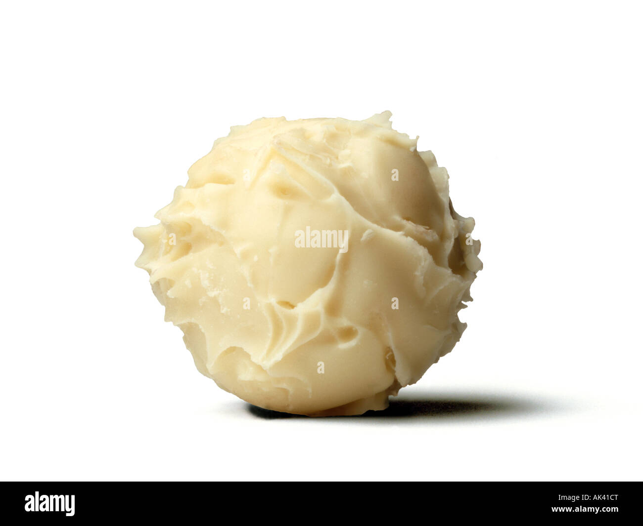 WHITE CHOCOLATE TRUFFLE WITH CUT OUT BACKGROUND Stock Photo