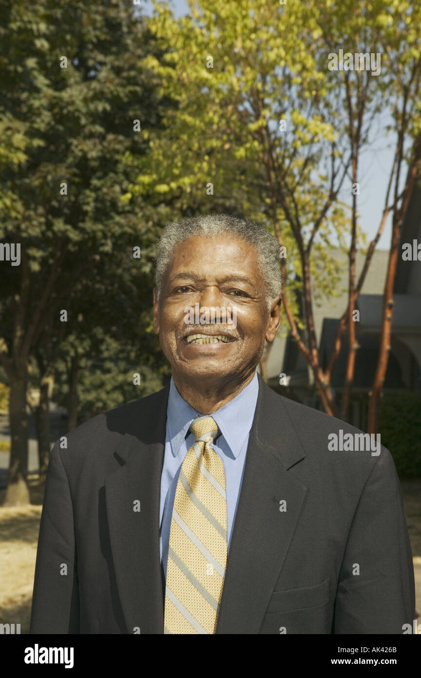 Portrait of a senior man wearing a suit Stock Photo - Alamy
