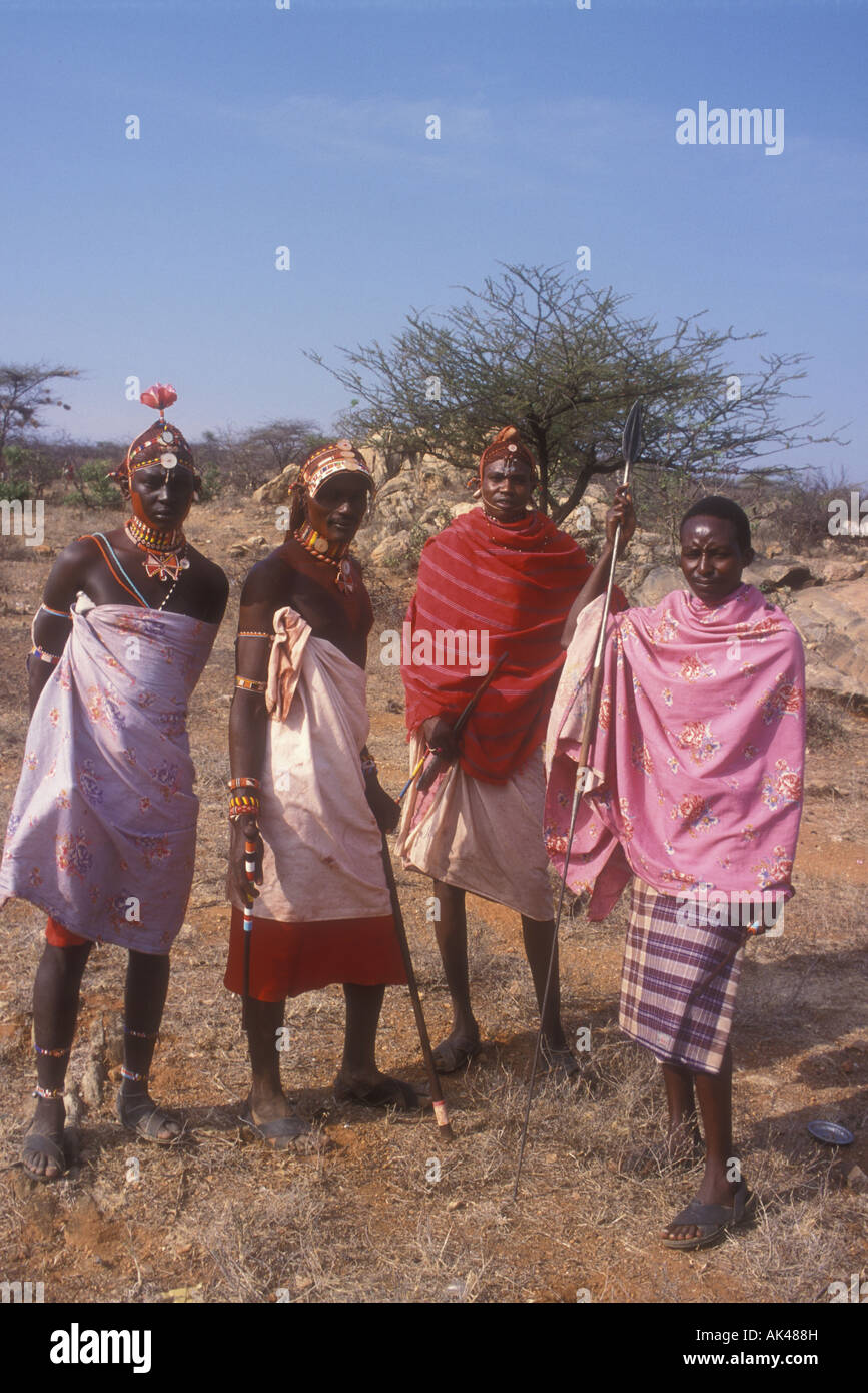 Four handsome Samburu warriors in traditional dress Samburu National Reserve Kenya East Africa Stock Photo