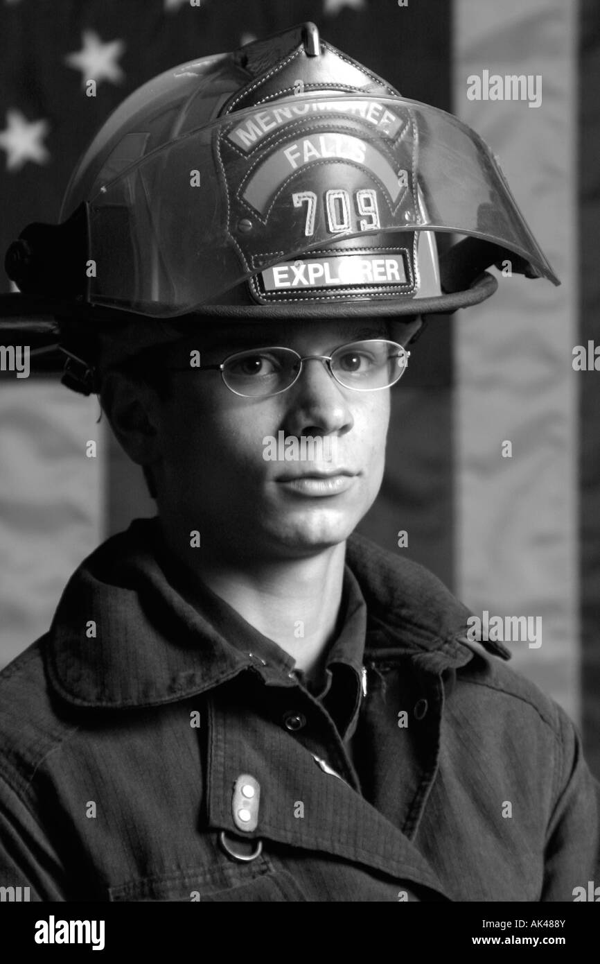 Black and white portrait of a male boy Explorer firefighter Stock Photo