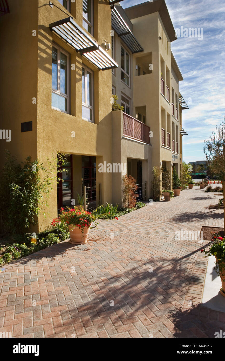 Exterior Shot of Yellow Stucco Store Front Stock Photo