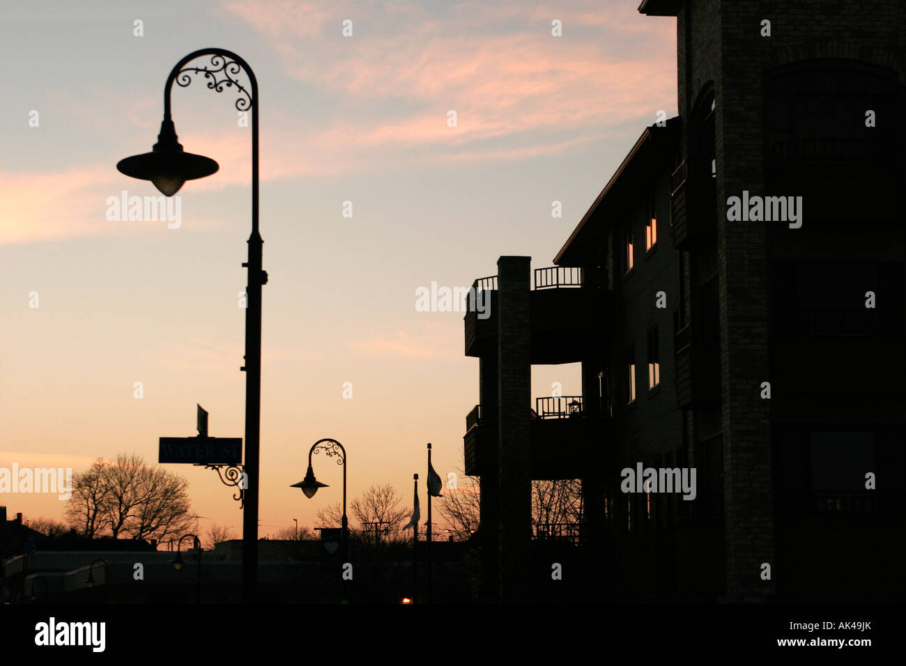 Street light pole and signs in a village center Stock Photo