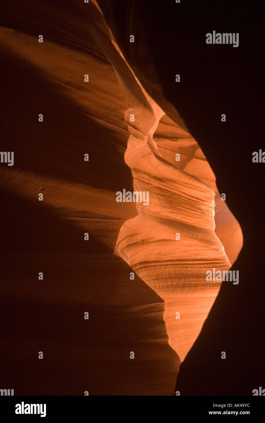 ARIZONA ANTELOPE SLOT CANYON SUNLIGHT GLOWING AGAINST COLORFUL SANDSTONE WALL FORMATIONS PAGE NORTHERN AZ Stock Photo