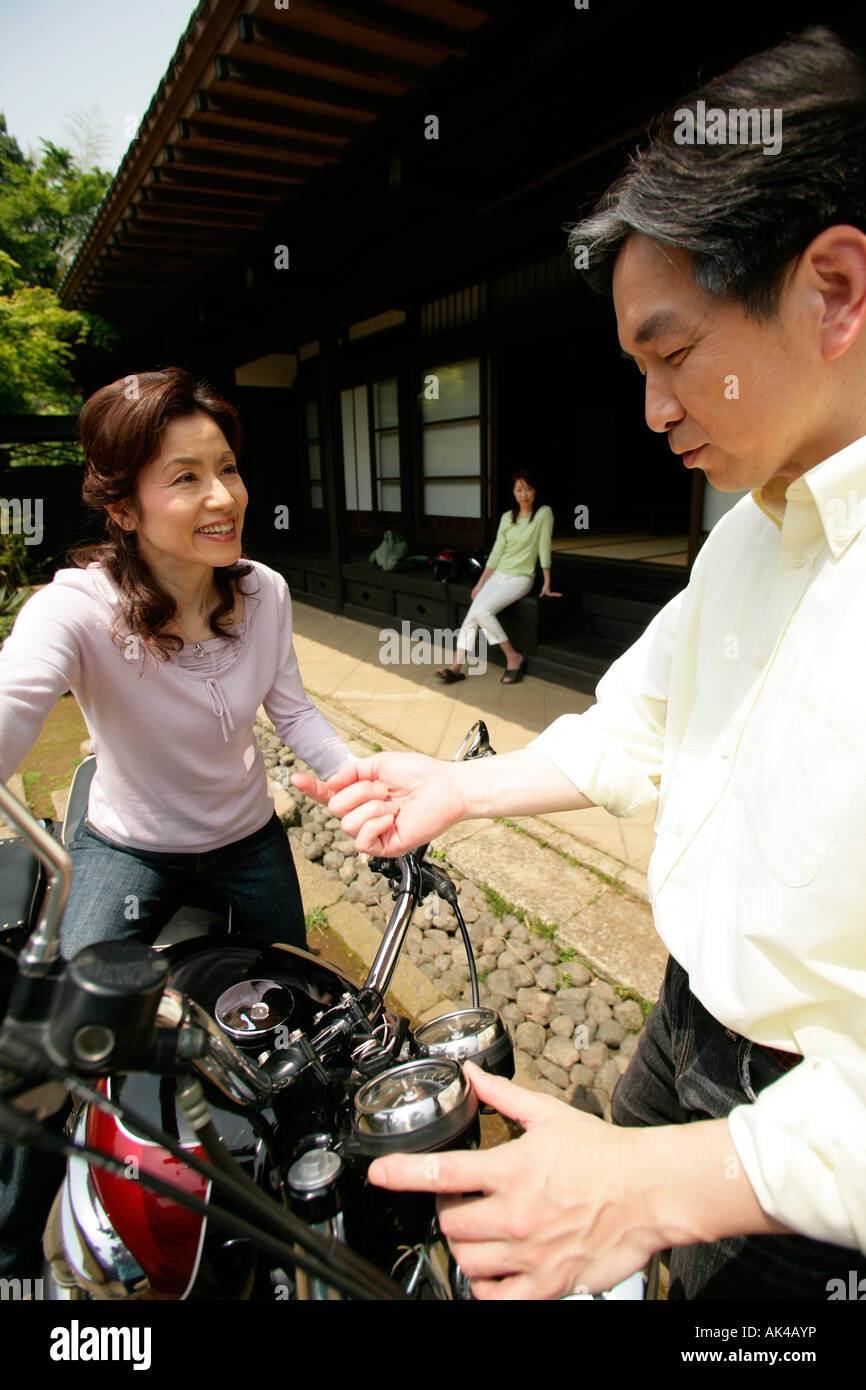 Japanese man woman standing hi-res stock photography and images - Alamy