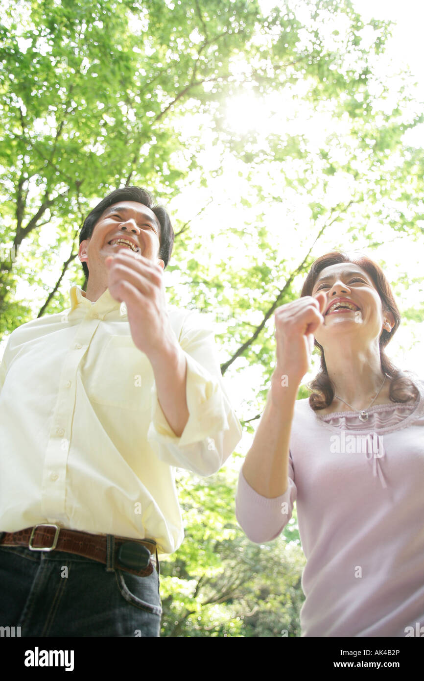 Mature couple relaxing in the park Stock Photo - Alamy