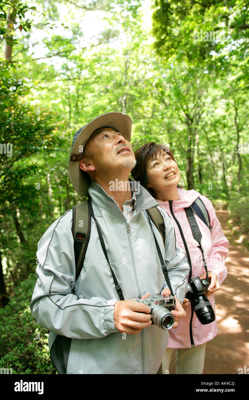 Mature couple relaxing in a park Stock Photo - Alamy