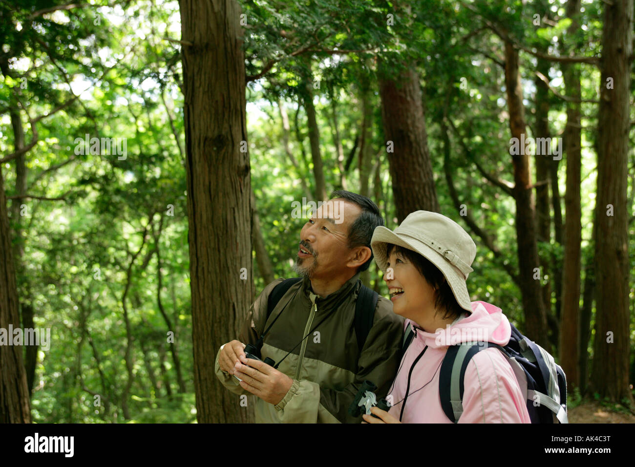 Mature couple relaxing in a park Stock Photo - Alamy