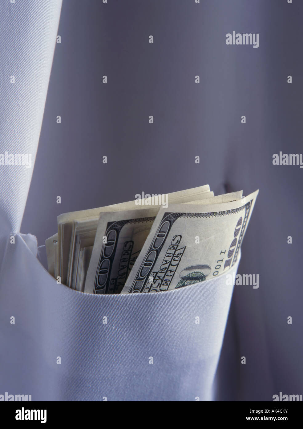 doctor with money in lab coat Stock Photo