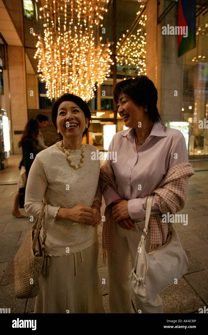 Two mature women standing hi-res stock photography and images - Alamy