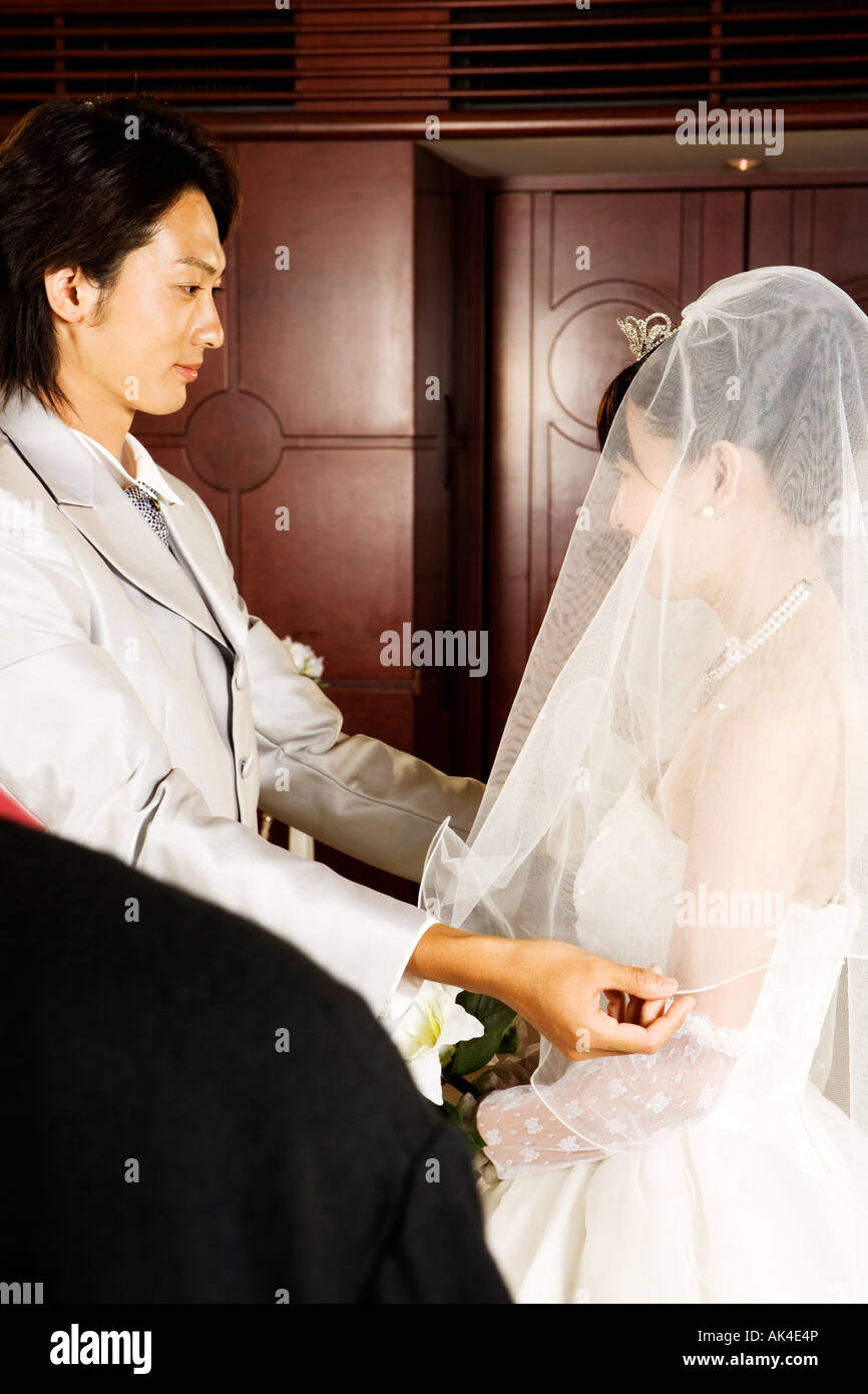 Groom lifting veil bride hires stock photography and images Alamy