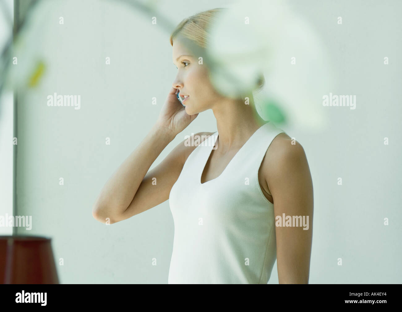 Woman using cell phone Stock Photo