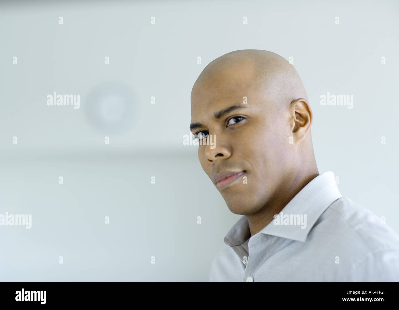 Black man with shaved head hi-res stock photography and images - Alamy