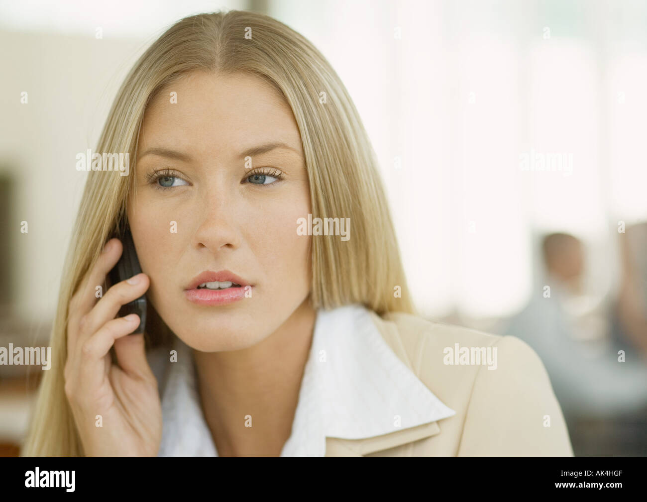 Cell Portrait Portrait serious young woman using hi-res stock photography and images ...