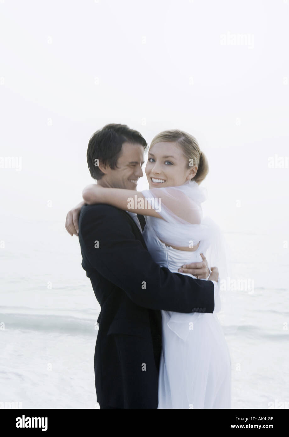 Woman arms around man wedding hi-res stock photography and images - Alamy
