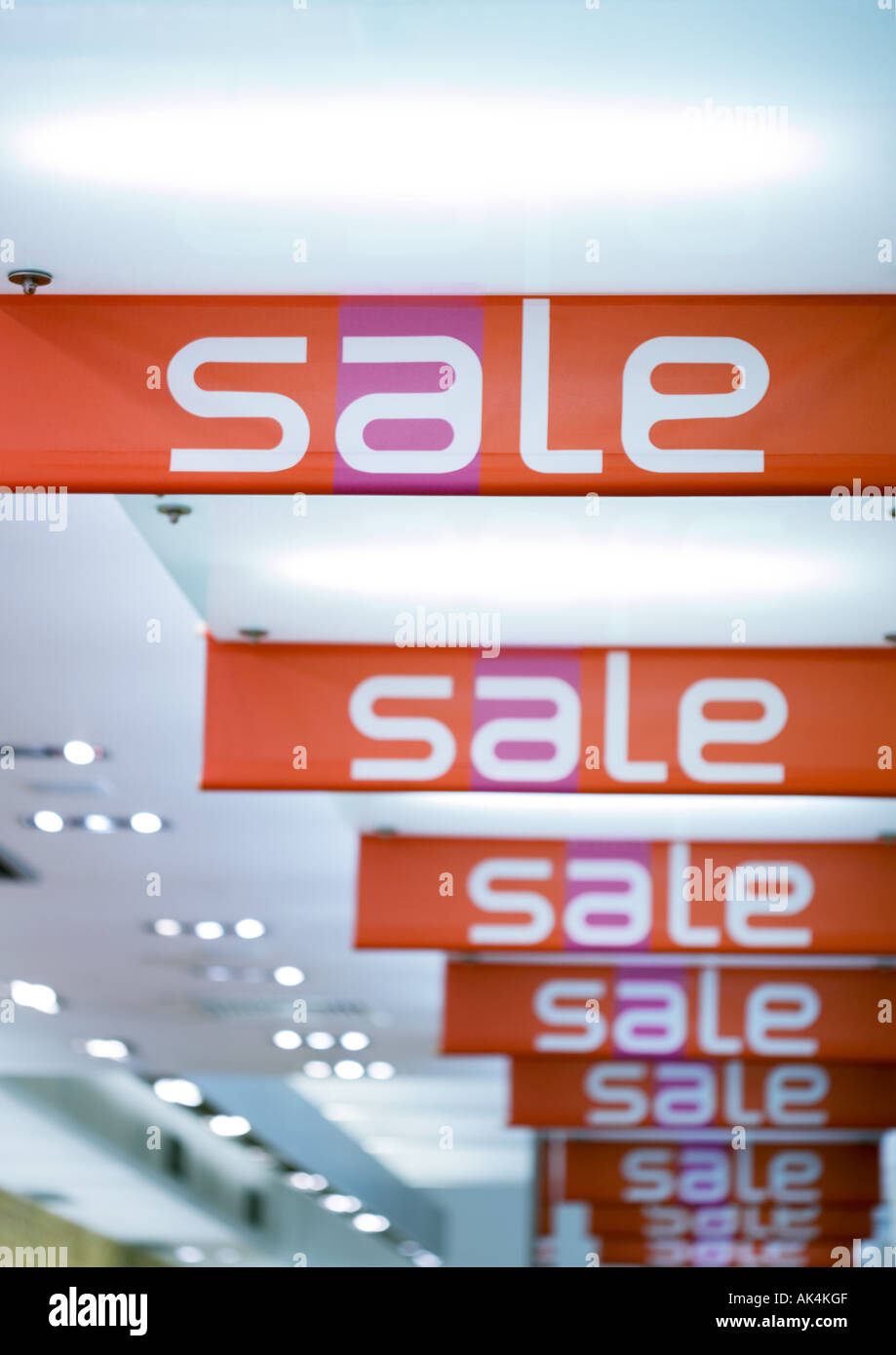 Sale signs hanging from ceiling Stock Photo
