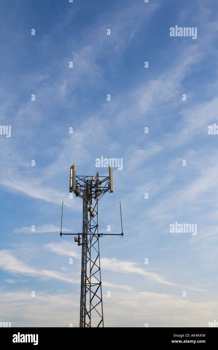"Mobile phone mast" radio base station against blue sky England UK