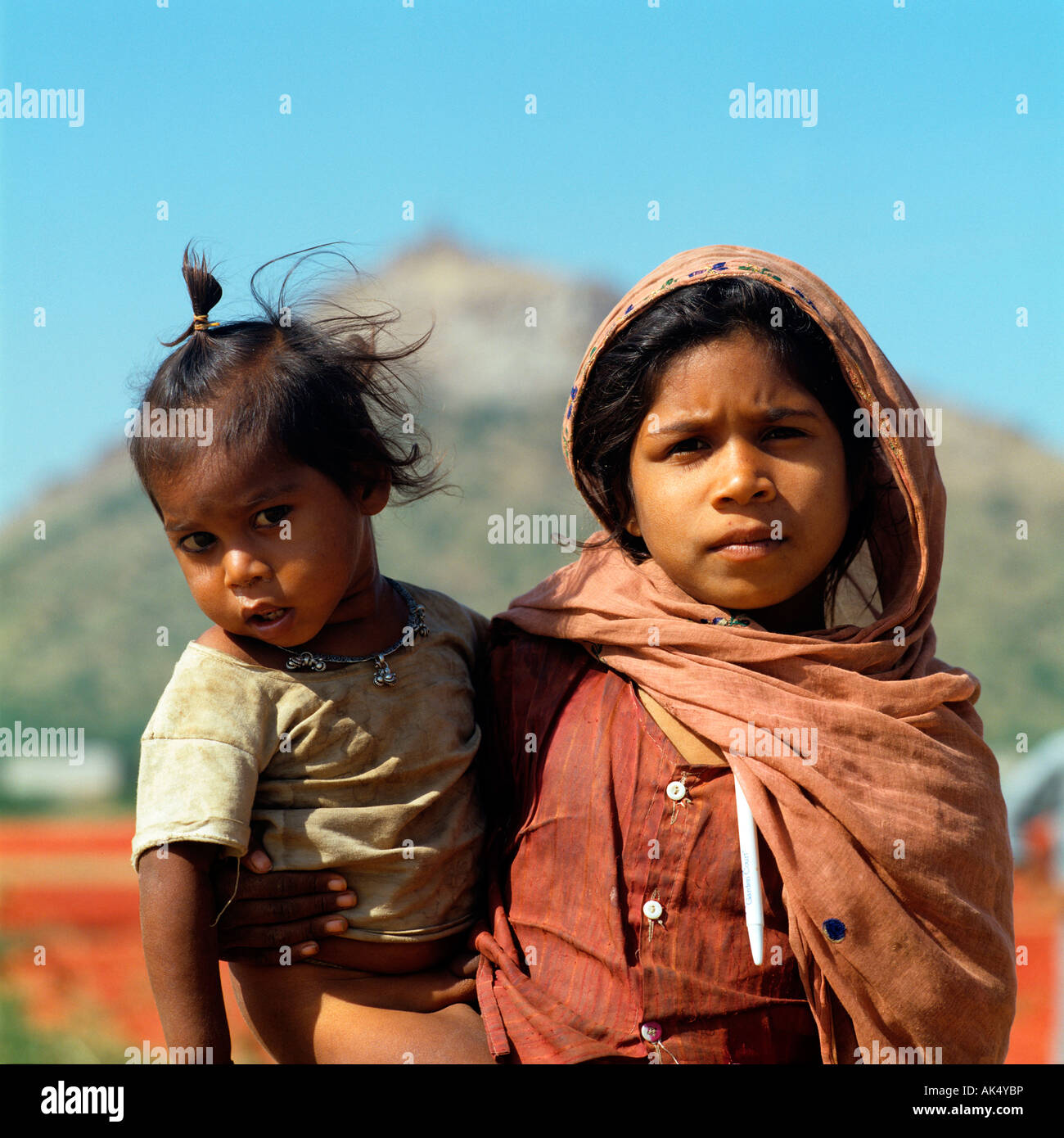 Girl with toddler Stock Photo