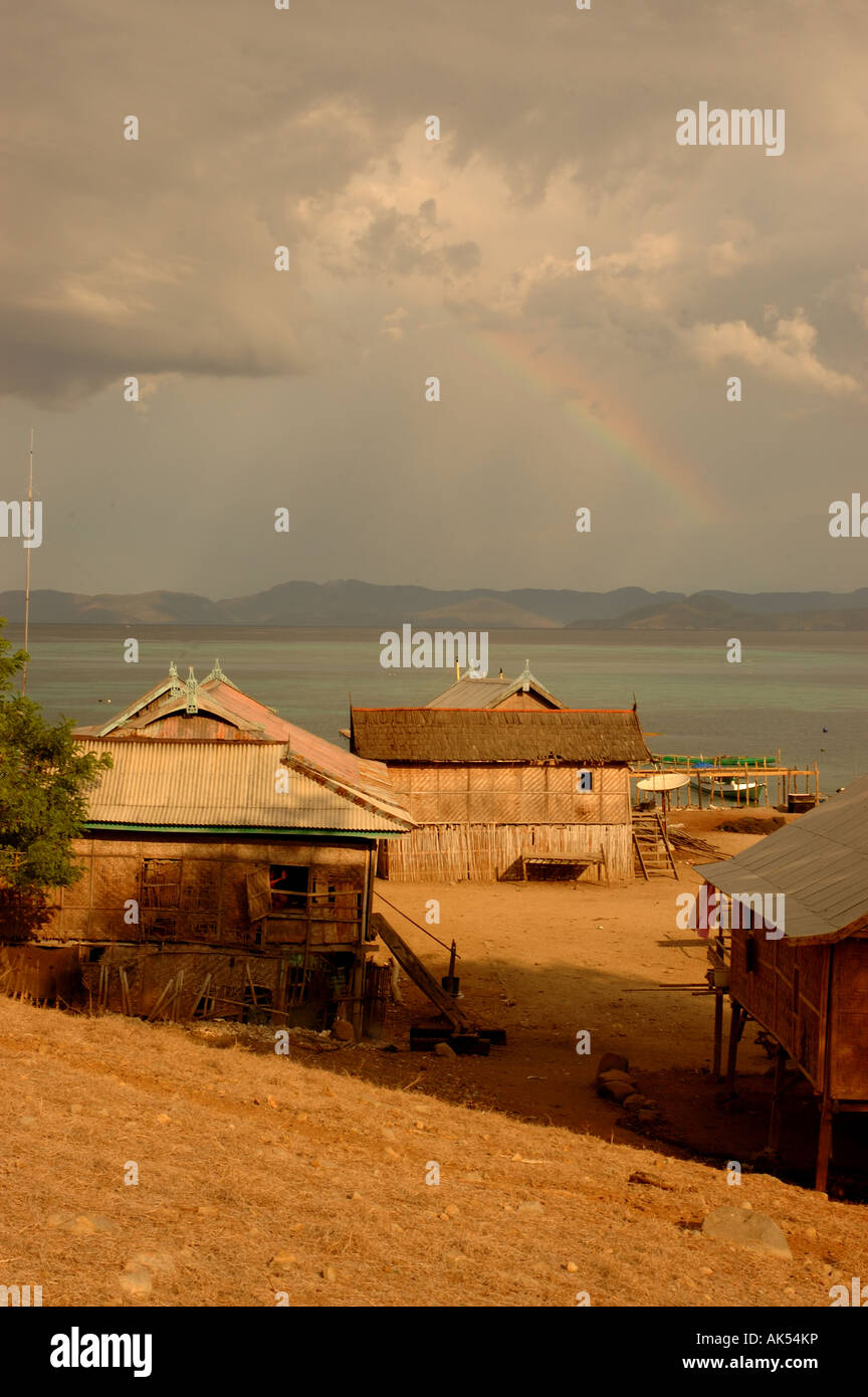 Local wooden homes on the small island of Saraya off Flores in