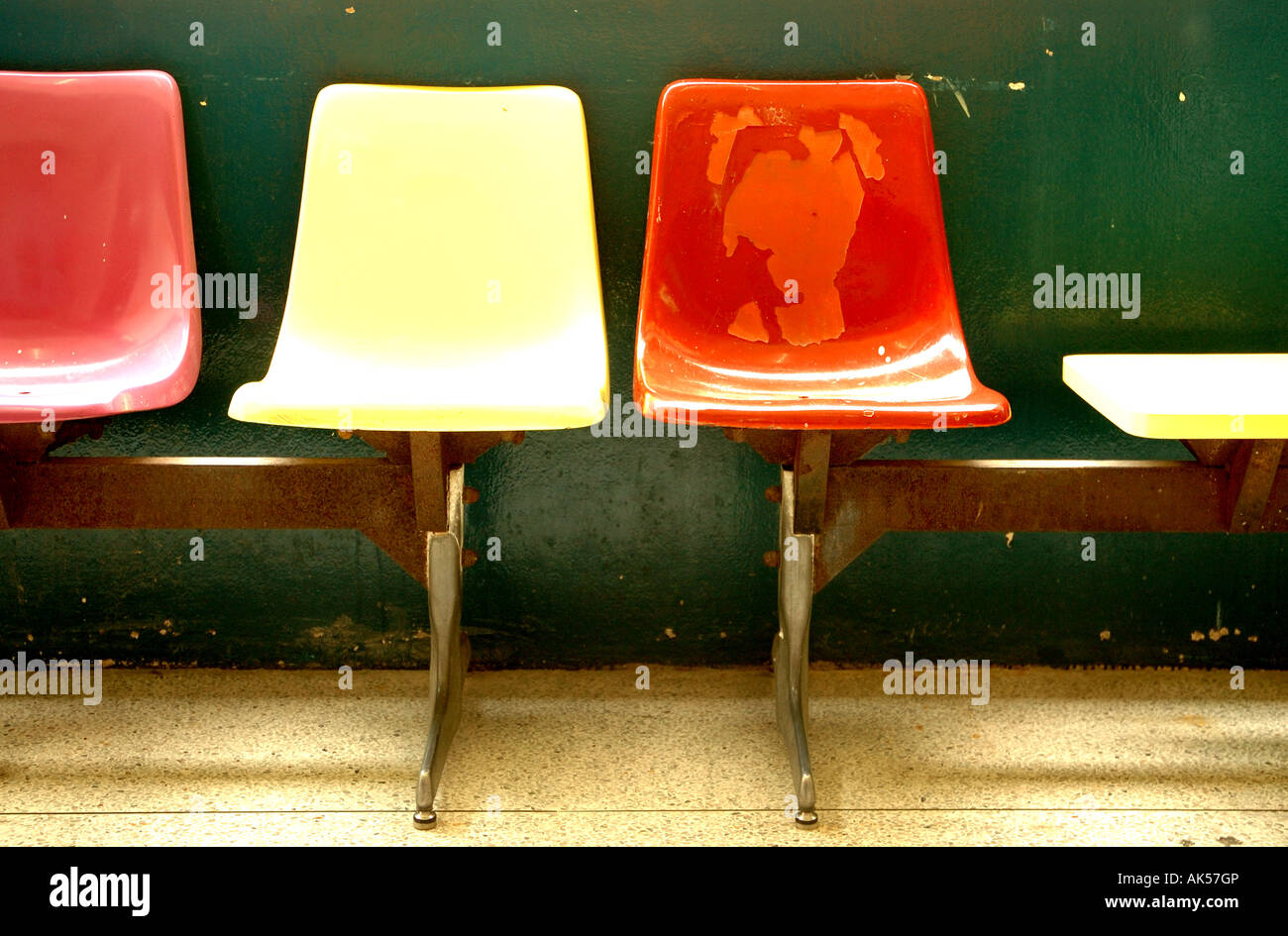 Three cheap plastic waiting room chairs Stock Photo Alamy