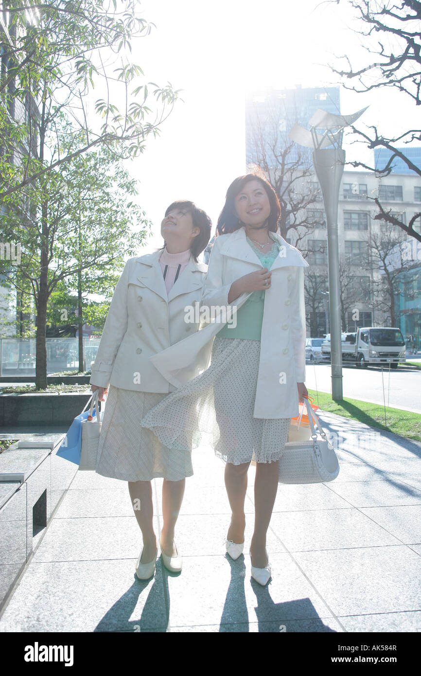Asian woman walking shopping hi-res stock photography and images - Alamy