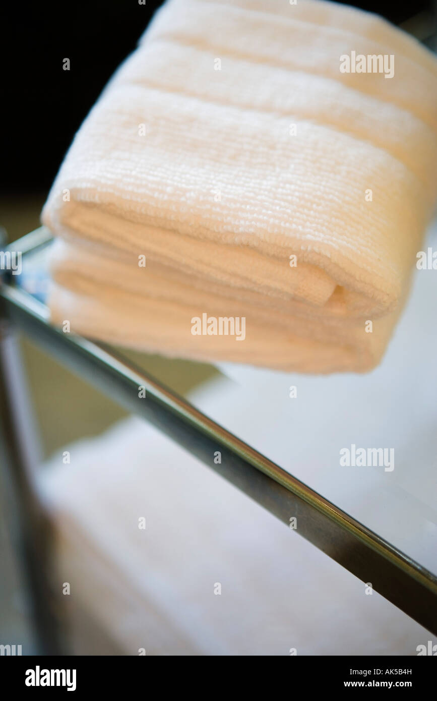 Folded Towel on Top of Glass Shelf Stock Photo Alamy