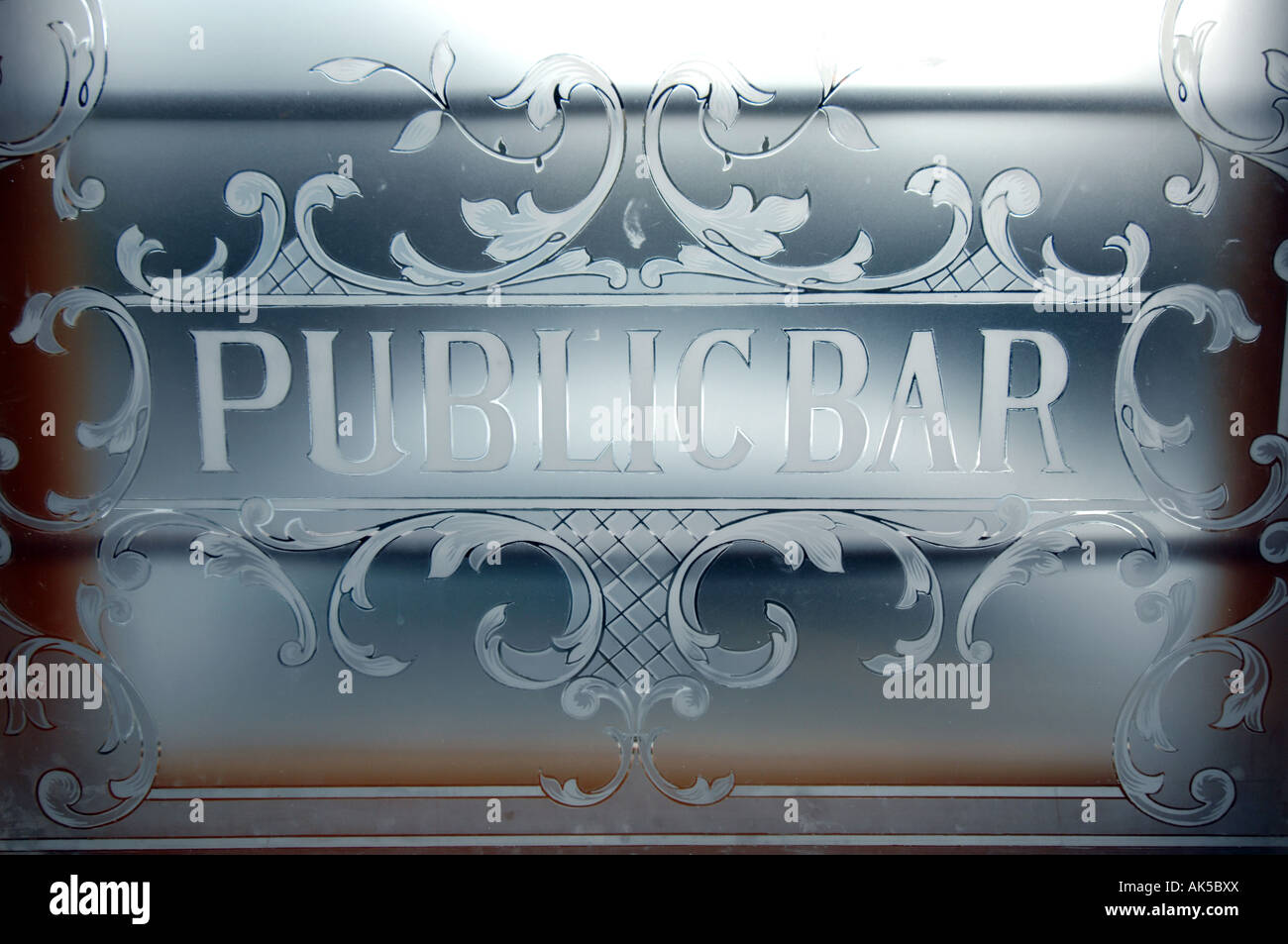Victorian etched glass door on the public bar of the Swan pub in Falmer, East Sussex Stock Photo
