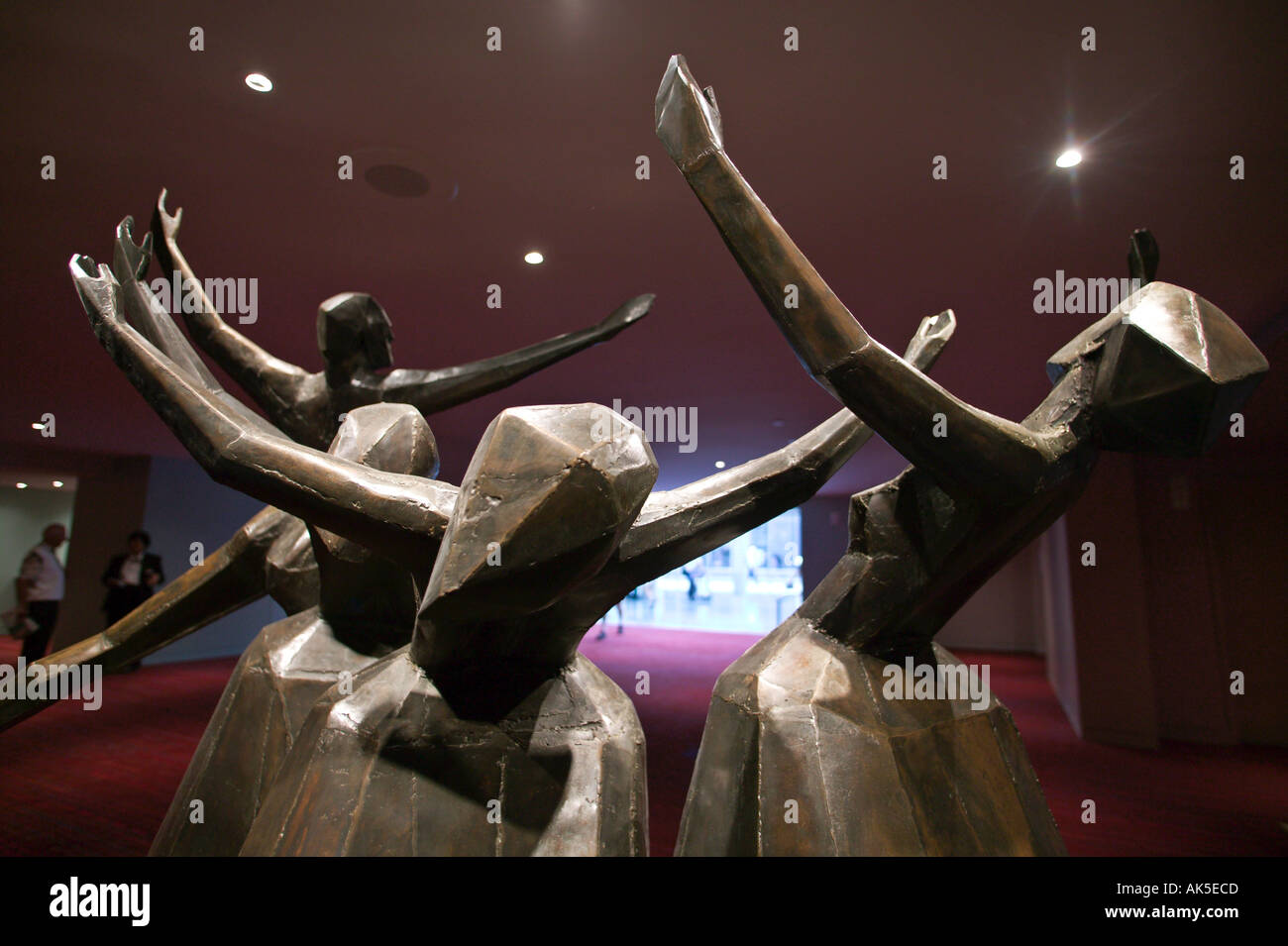 The Dance sulpture by Ray Jensen of cut shaped and welded bronze in lobby area of Marion Oliver McCaw Hall for Performing Arts a Stock Photo