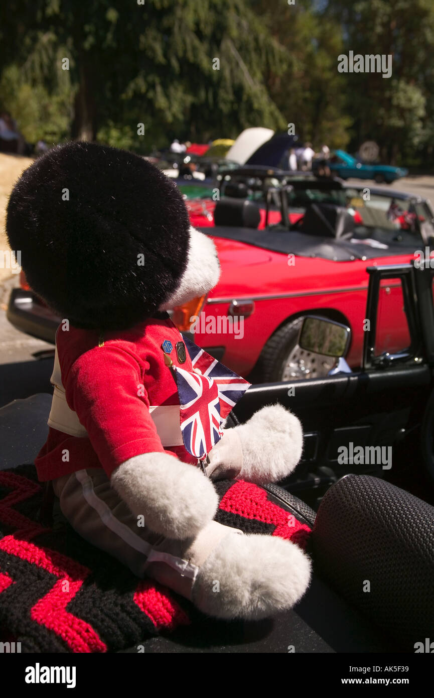 Bear with fur hat and British Flag sits in 1975 MGB All British Field Meet classic car show