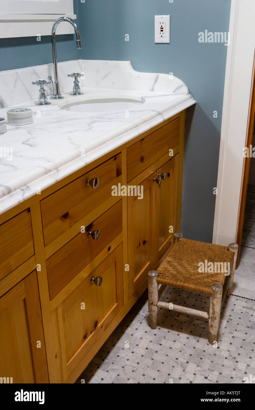 Traditional Bathroom and Wicker Foot Stool Stock Photo Alamy