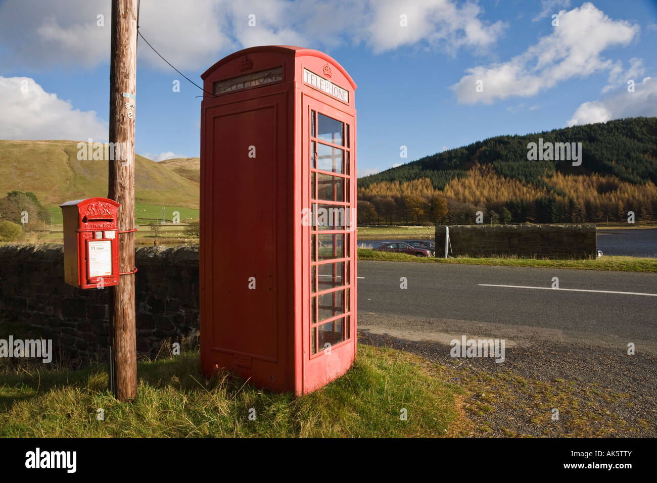Rural communications red post and telephone boxes at St Mary's Loch Scottish Borders Stock Photo