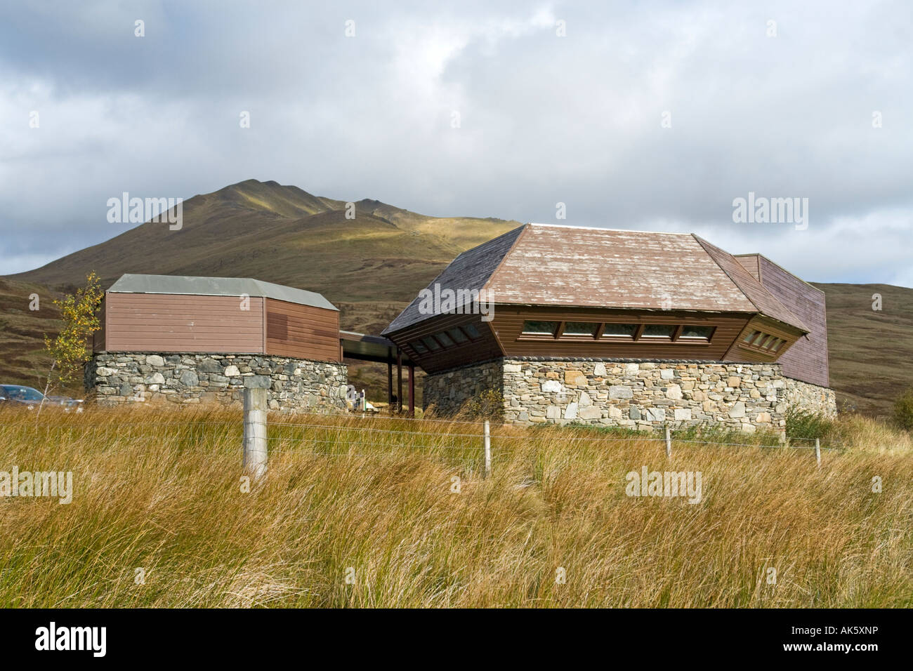 National Trust for Scotland visitor centre at the Ben Lawers car park with Tayside mountain Ben Ghlas behind Stock Photo