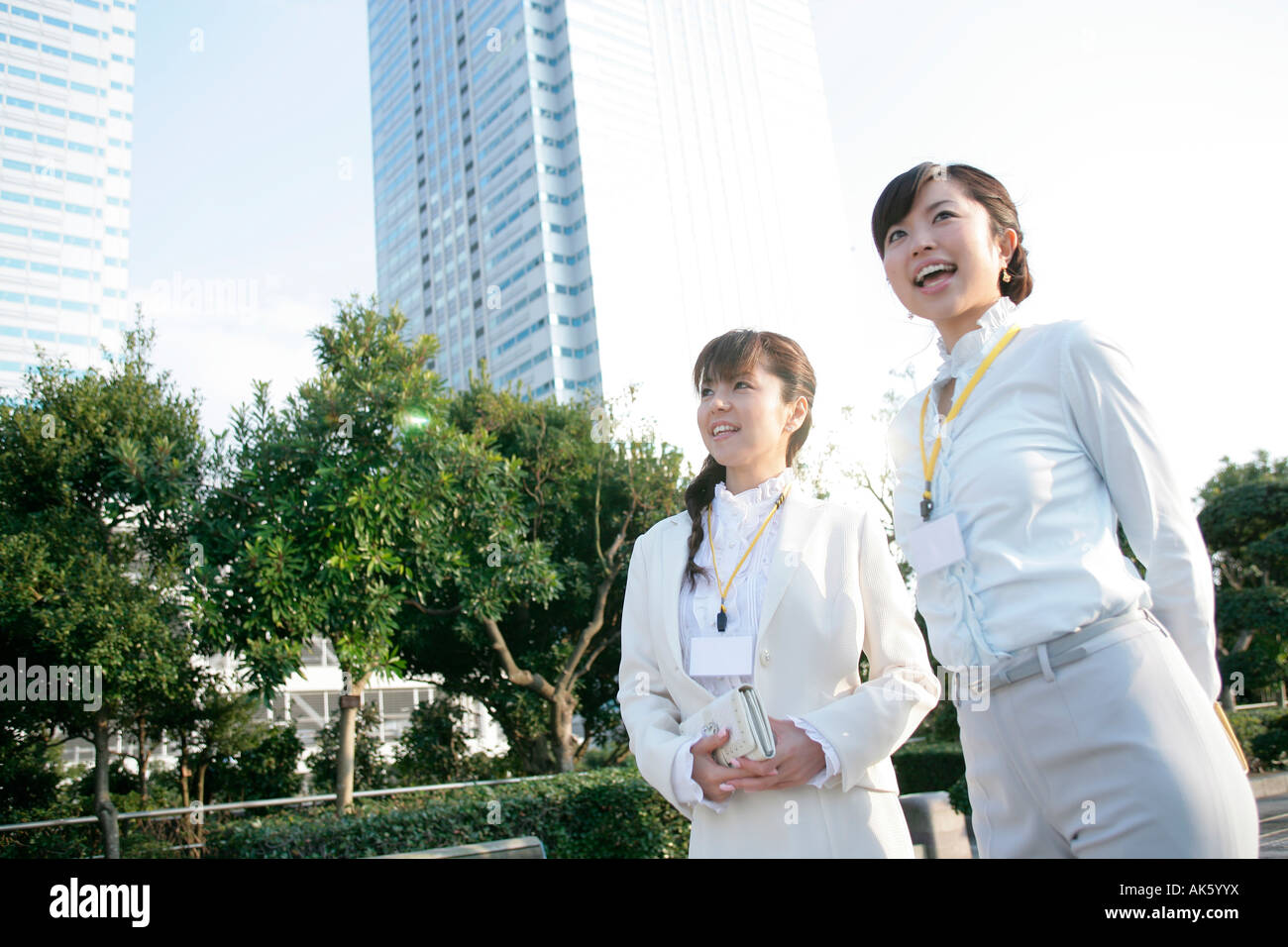 Back view two asian workers hi-res stock photography and images - Alamy