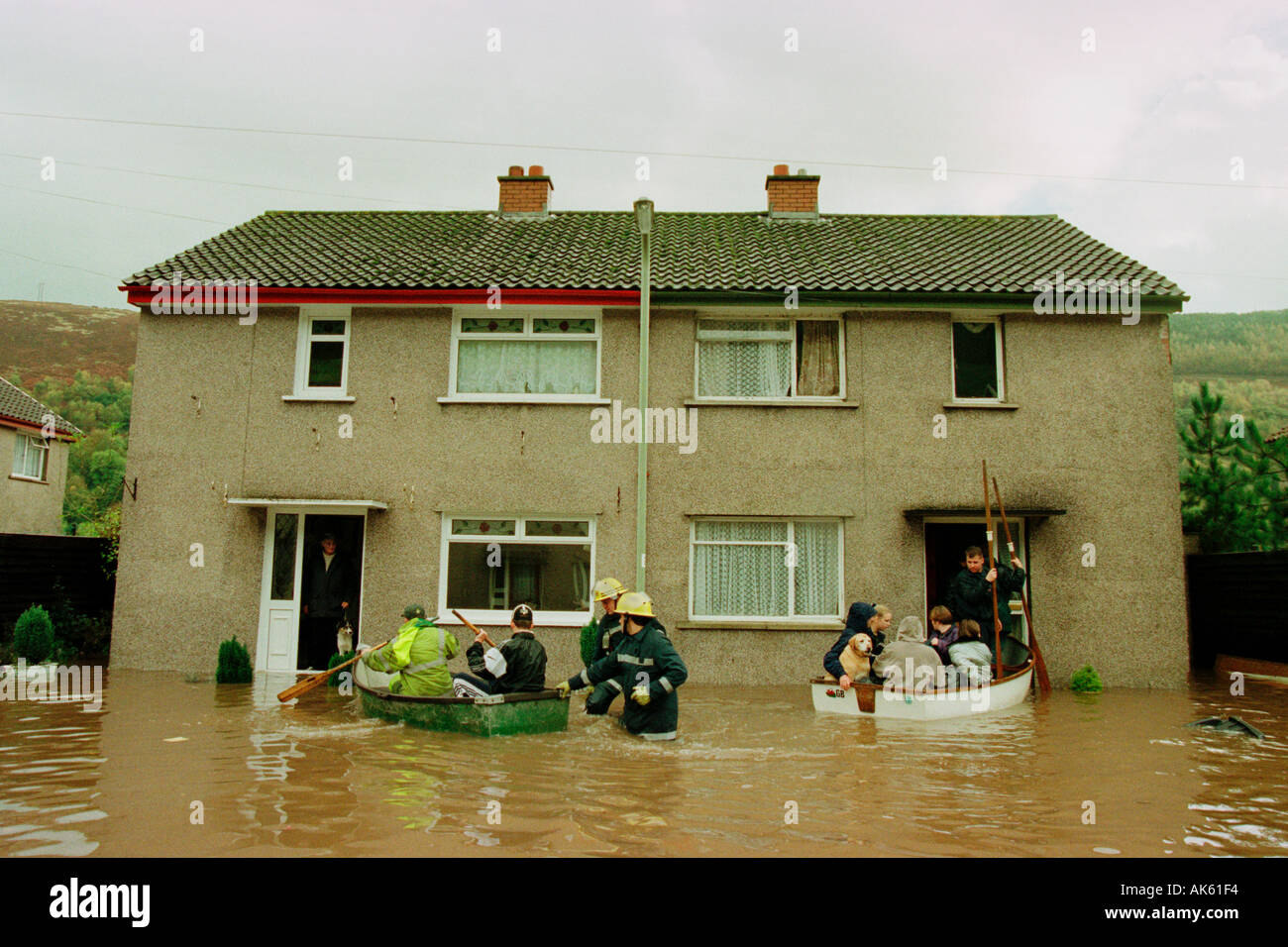 Residents being rescued after the River Taff burst it s banks at Aberfan South Wales UK GB EU Stock Photo