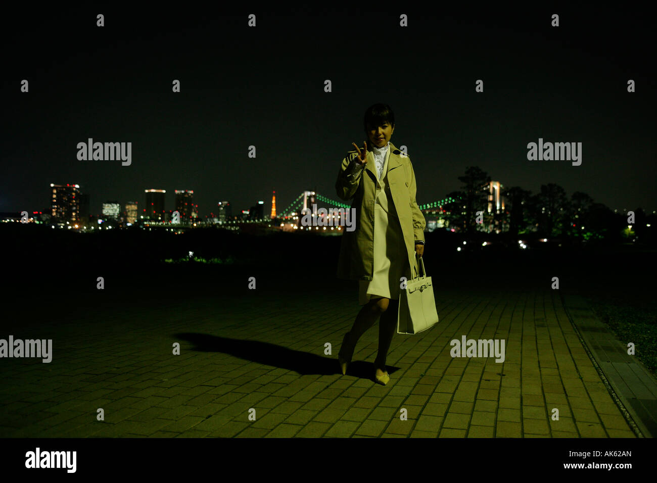 Woman on street posing night hi-res stock photography and images - Alamy