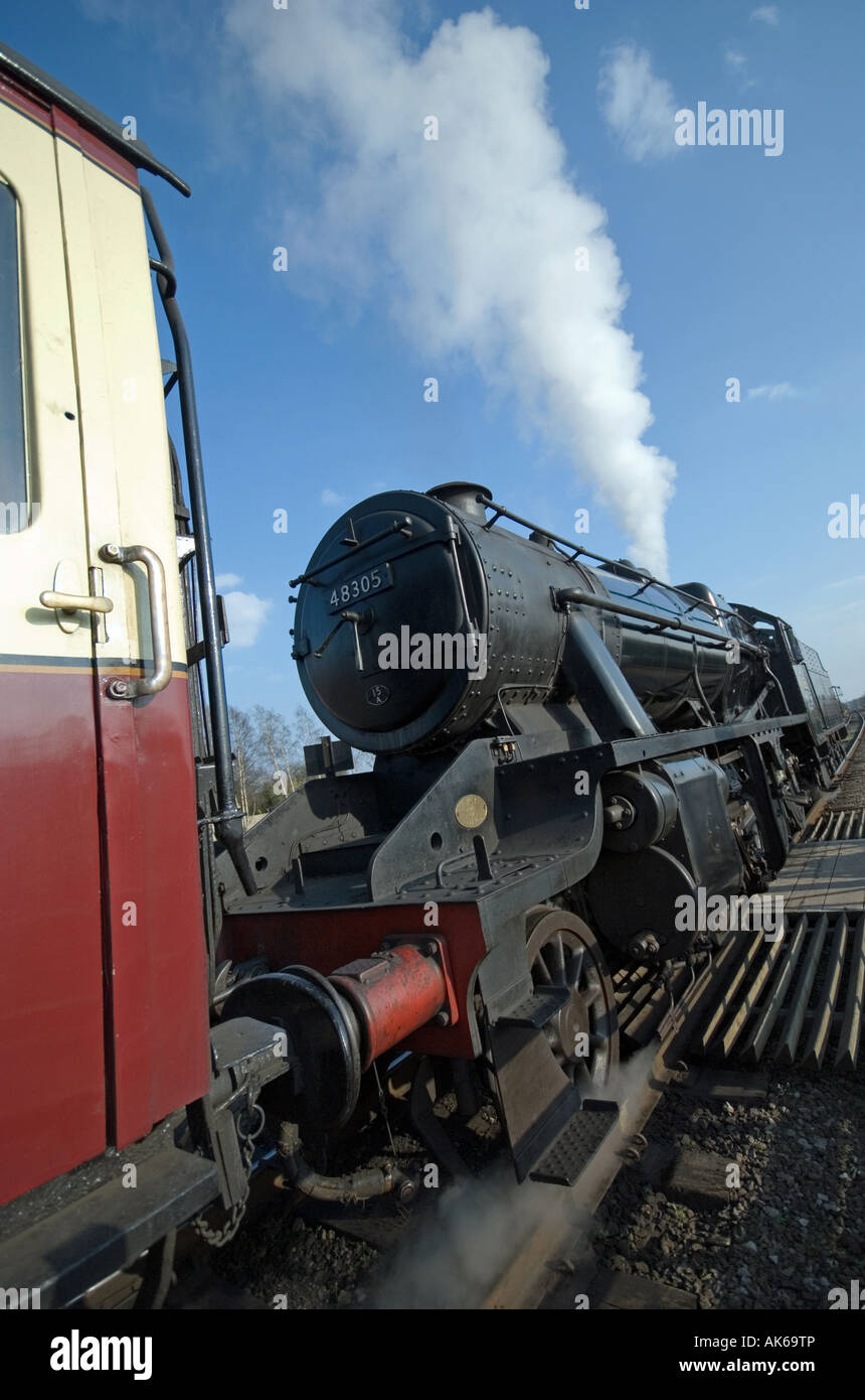 A Stanier LMS Class 8F 2-8-0 steam locomotive at the Great Central Railway, Quorn, Leicestershire, UK. Stock Photo