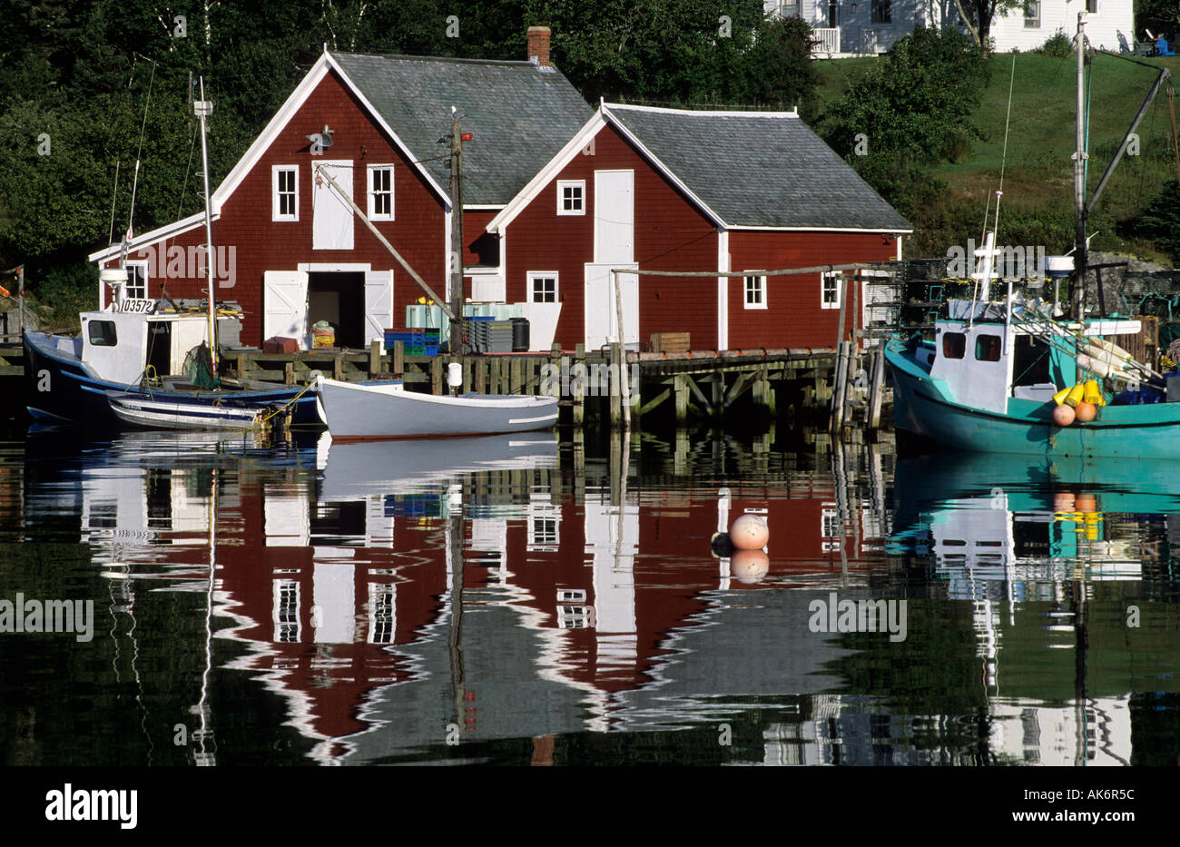 fishing cabins in the harbor of Northwest Cove Stock Photo Alamy