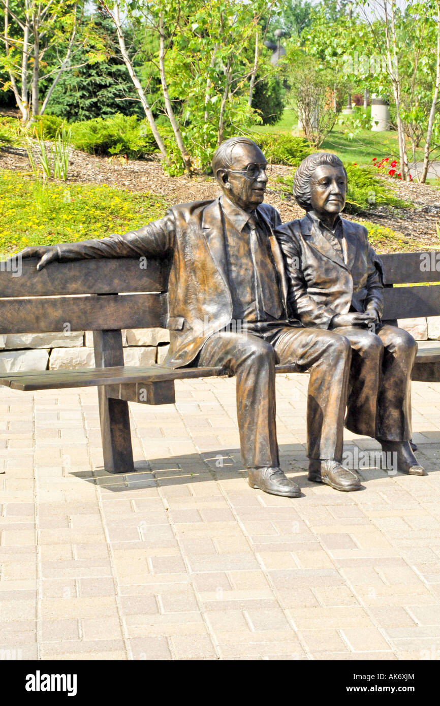 Bronze statues of Frederik and Lena Meijer at their gardens in Grand Rapids Michigan MI Stock Photo