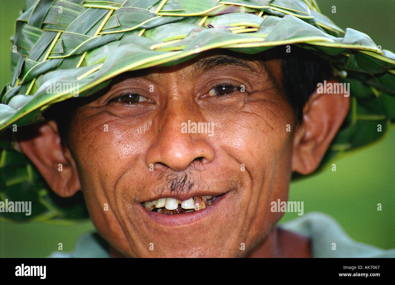 Portrait of a Man in a Banana-leaf Hat, Bali (Indonesia Stock Photo - Alamy