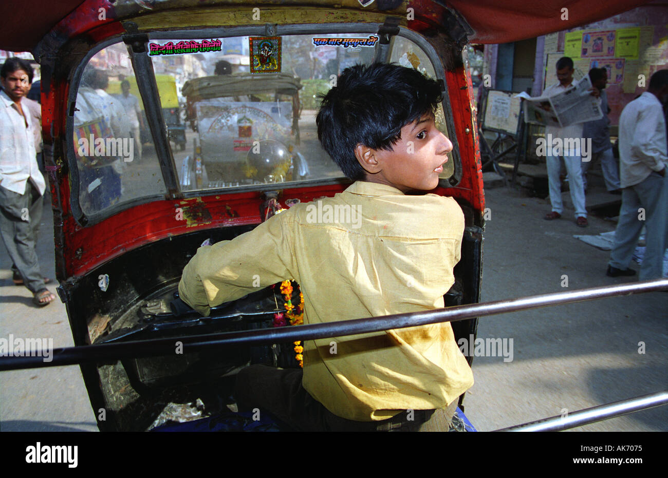 Young Rickshaw Driver, India Stock Photo