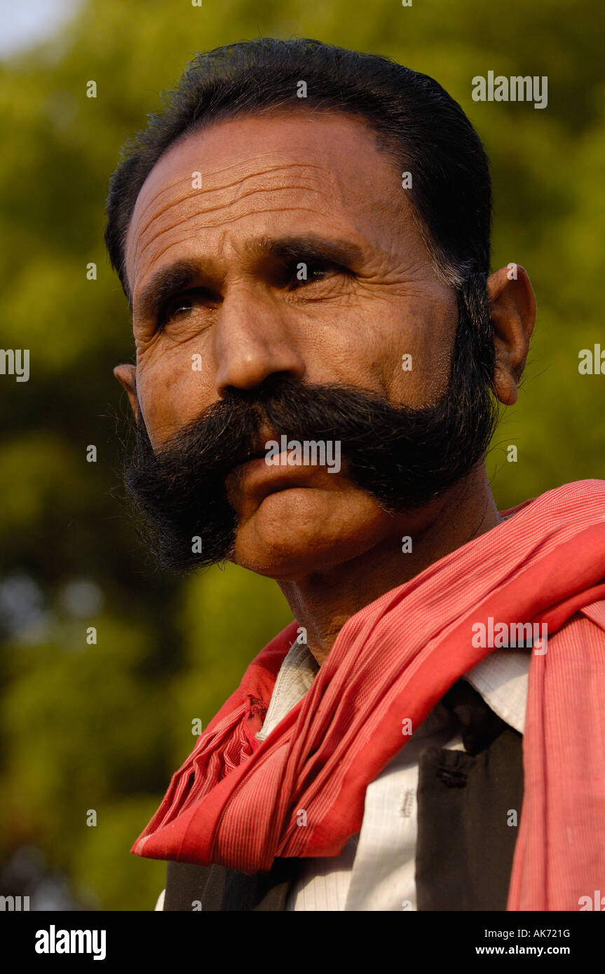 Rajasthani man showing off his long moustache. Pushkar, Rajasthan