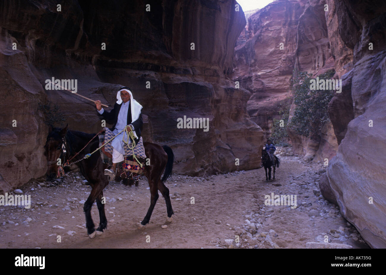 Horse Rider in the Great Siq Petra Jordan Stock Photo