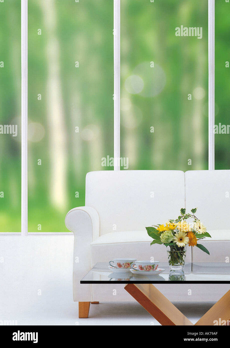 Sofa table by the window Stock Photo Alamy