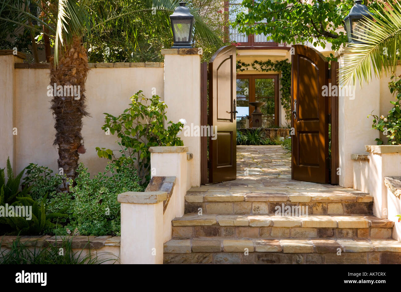 Front Gate and Steps to Spanish Style Home Stock Photo Alamy