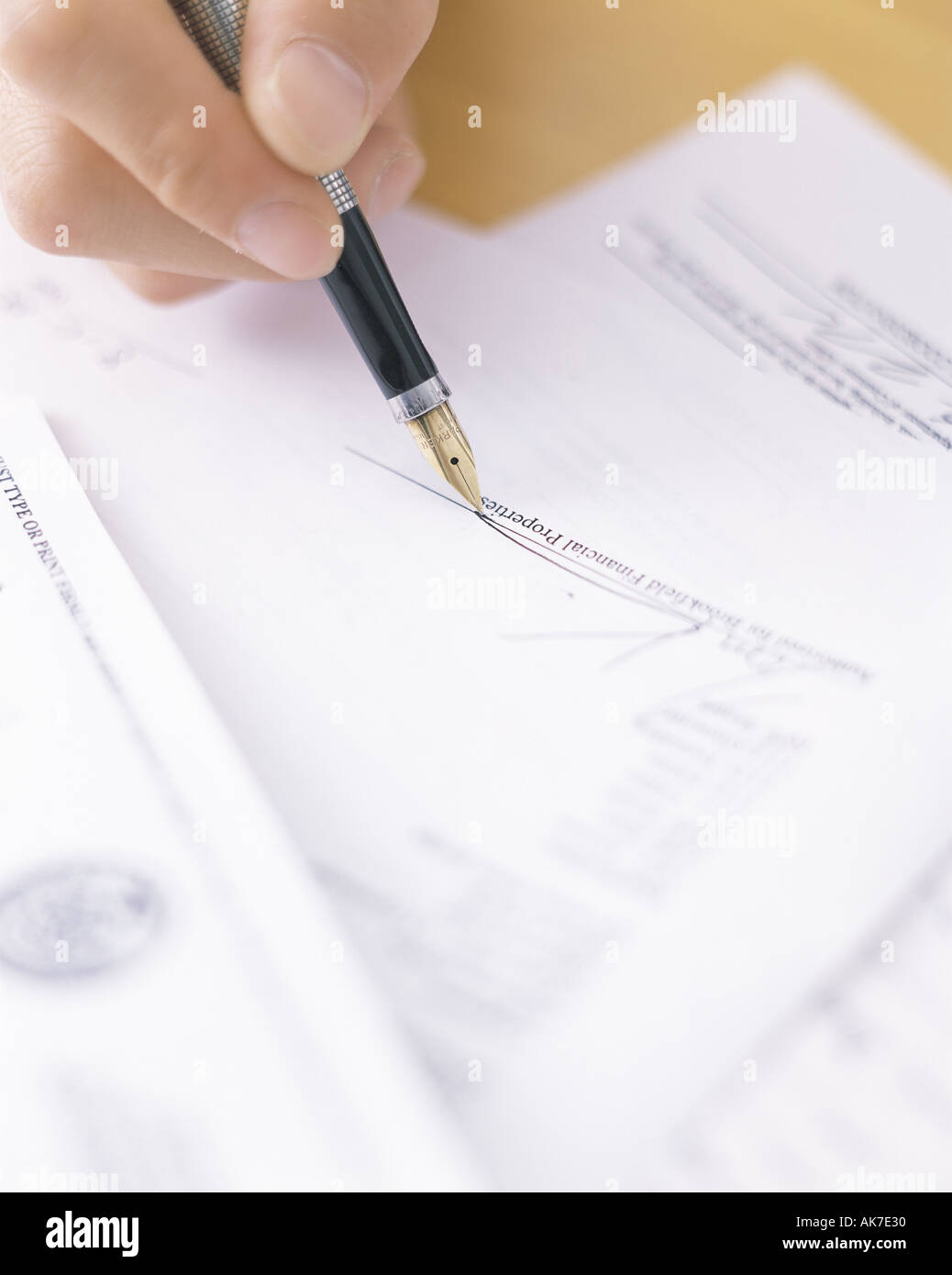 Signing Hand Example Hands men signing documents hi-res stock photography and images - Alamy