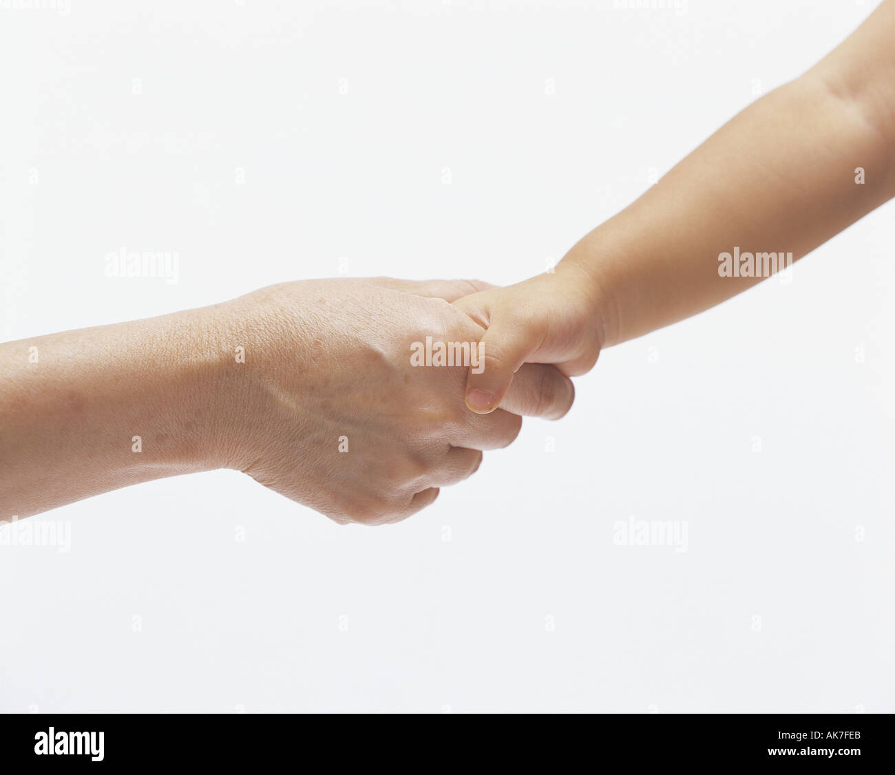 Hands of elderly child holding hands Stock Photo