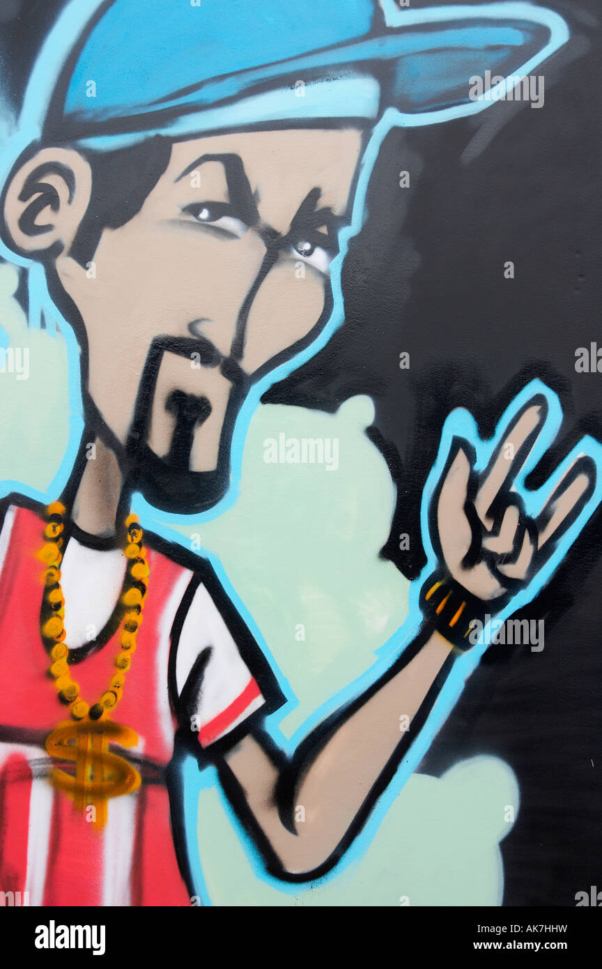 Graffiti of hip hop youth sprayed on wall Stock Photo