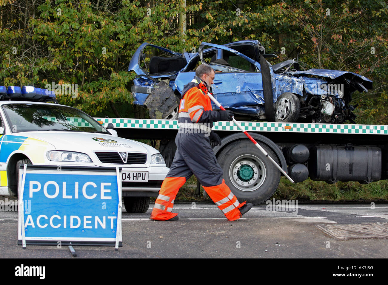 Police accident  investigators at the scene of a car crash near Aberdeen, Scotland, UK Stock Photo