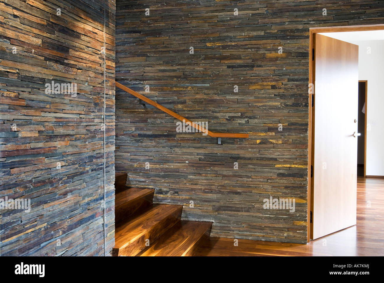 Hardwood Staircase with Stone Tile Walls Stock Photo Alamy